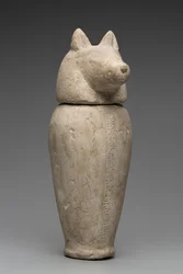 Canopische kruik met jakhalzenkop (kalksteen)