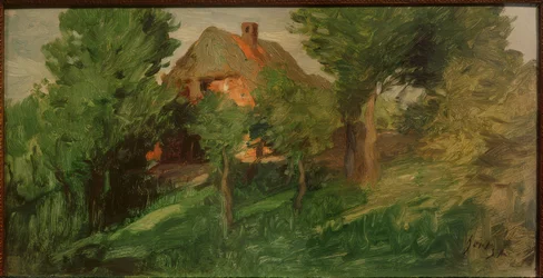 Rood huis achter bomen