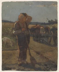 Boer staand met schep op het land