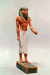 Oude Egyptische figuur van een koopman