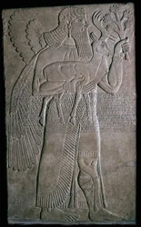 Assyrisch reliëf van een gevleugeld figuur, 9e eeuw v.Chr.