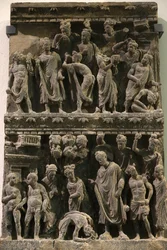 Het Victoria en Albert Museum. Reliëf dat een poging tot moord op de Boeddha toont. 100-200. Schist. Gandhara/Noordwest Pakistan. Verenigd Koninkrijk