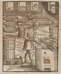 Een man test salpeter, gebruikt in buskruit en voor het conserveren van vlees - Gravure uit Beschrijving van mineralen en de belangrijkste mijnbouwmethoden, van Lazarus Ecker
