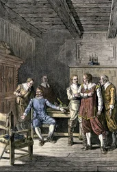 Verenigde Staten, Massachusetts: Geschil tussen John Winthrop (1588-1649) en Thomas Dudley (1576-1653) in de Massachusetts Bay Colony. Kleurgravure uit de 19e eeuw