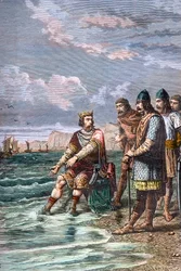 Knoet de Grote overtuigt zijn hovelingen dat hij niet de macht heeft om het tij te keren - koning Knoet II de Grote (Knud I de Grote) (circa 995-1035), koning van Engeland vanaf 1016, van Denemarken vanaf 1018 en van Noorwegen vanaf 1030