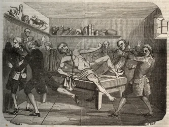 Galvanisatie van het lijk van een beul met de stapel van Alessandro (Alexandre) Volta: onder invloed van elektriciteit lijkt het lijk weer tot leven te komen. Gravure uit 1856 in 