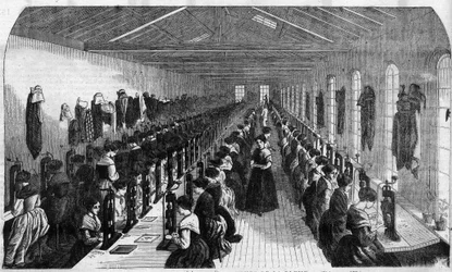 Fabricage van cementpennen: arbeiders tijdens de realisatie van de pennensleuf in een fabriek in Birmingham - Gravure in 