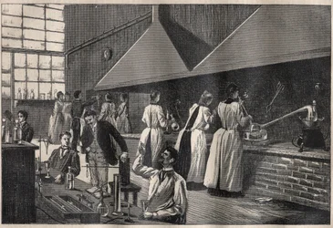 Studenten en professoren in het praktische laboratorium van het Conservatoire des Arts et Metiers (Arts-et-Metiers) van Parijs