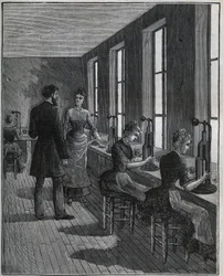 Fabricage van metalen veren: uitsnijwerkplaats in Frankrijk in de 19e eeuw. Gravure uit 1885 in 