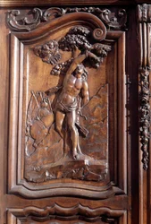 Het martelaarschap van San Sebastian, detail van de gesneden houten deur van de kerk van de onbevlekte ontvangenis, Menton.