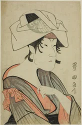 Nakayama Tomisaburo. Gekleed als een vrouw met een handdoek op haar hoofd