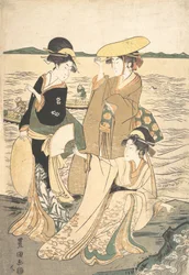 Drie jonge dames aan de kust