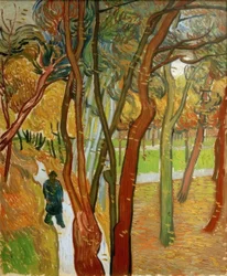 Wandelaars in het park met vallende bladeren