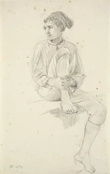 Zittende jonge visser