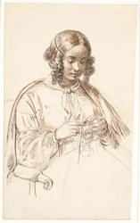 Jonge breiende dame, halve figuur