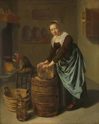 Vrouw die een vat schrobt