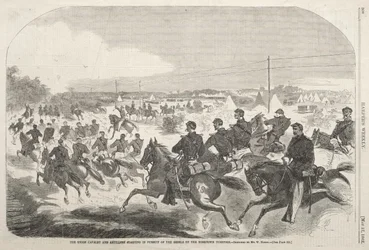 De cavalerie en artillerie van de Unie zetten de achtervolging in op de rebellen op de Yorktown Turnpike